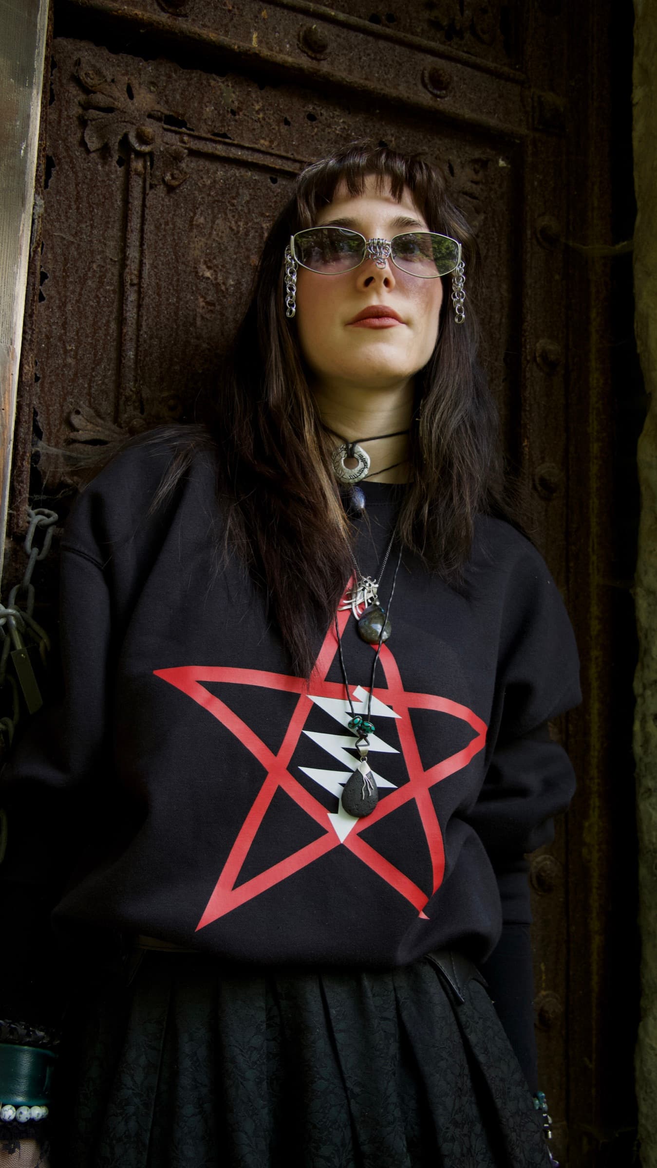 Front view of the black LVX crewneck sweatshirt with its large red and white print